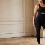 Femme en leggings gainant noir et top de sport, bannière principale.